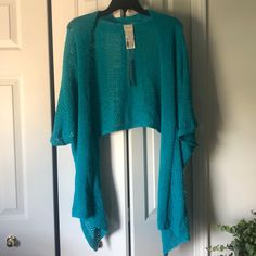 Light Knit Wrap In Turquoise Size S/M Casual Light Blue Summer Sweater, Blue Knit Cardigan For Spring, Blue Soft Knit Spring Cardigan, Blue Soft Knit Cardigan For Spring, Fitted Blue Open Knit Cardigan, Light Blue Stretch Sweater For Spring, Blue Summer Sweater For Vacation, Blue Summer Sweater For Beach, Fitted Blue Cardigan For Summer