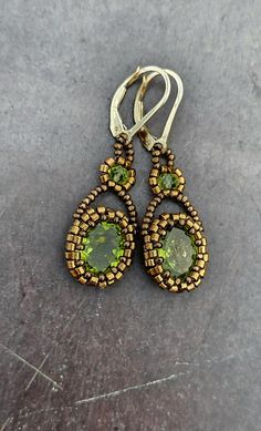 These earrings feature one pair of faceted, sparkling, vibrant green Peridot centerpieces. With Peridot beads, and 14k gold-filled leverback findings. Peridot Earrings, Sky Blue Topaz, Green Peridot, Earrings Blue, Vibrant Green, Blue Topaz, Sky Blue, Portland, Jewelry Earrings Dangle