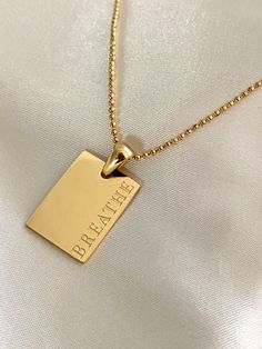 Positive affirmation's daily reminder necklace. Perfect layering necklace. This necklace is made of stainless steel, so waterproof! The color remains perfect. Gold: 18k gold platingMaterial: Stainless steelLength: 40cm-45cmSize: 5mmNeed a Longer Chain?Add up to 2.5" on any of our necklaces with our "Extender's" Waterproof jewelry Glazd Pouch with every order Free US shipping Easy Exchange & Return policy PRODUCT INFOAll our jewelry are made of stainless steel material. For the gold pieces, we ad Rectangle Pendant Necklace, Waterproof Jewelry, Square Pendant, Gold Piece, Layering Necklace, Long Chain, Daily Reminder, Jewelry Pouch, Wedding Necklace