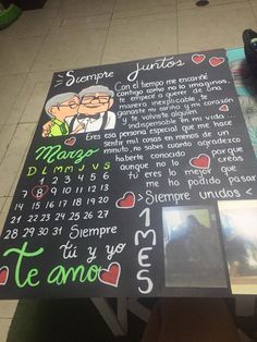 a table that has some writing on it with pictures and other things written in spanish