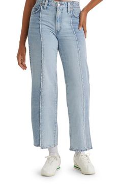 Inspired by '90s dad jeans, this extraroomy pair is made from nonstretch denim with raw-cropped hems and two-tone patchwork construction. 18 1/2" leg opening; 10 3/4" front rise; 15" back rise Zip fly with button closure Five-pocket style 100% cotton Machine wash, tumble dry Imported Relaxed Fit Cropped Bottoms For Streetwear, Relaxed Fit Wide Leg Cropped Jeans In Recycled Denim, Wide Leg Cropped Jeans In Recycled Denim, Trendy Levi's Rigid Denim Bottoms, Relaxed Fit Jeans With Frayed Hem In Rigid Denim, Cropped Denim Pants With Frayed Hem, Relaxed Fit Denim Jeans With Frayed Hem, Levi's Relaxed Fit High Rise Jeans, Denim Jeans With Frayed Hem And Relaxed Fit