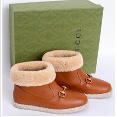 Gucci's 'Fria' Caramel Leather Ankle Boots. -Signature Horsebit Detail In Gold-Tone. -Made In Italy From Supple Calfskin Tan Leather And Trimmed With Faux Shearling Along The Midsoles. -Rubber Sole Measures Approximately 15mm/ 0.5 Inches. -Pull On Style. -Made In Italy. Comes With Gucci Box, Gucci Cards And 2 Gucci Dust Bags Brown Stiletto Boots, Gucci Boot, Gucci Booties, Gucci Ankle Boots, Gucci Box, Gucci Boots, Buckle Booties, Studded Ankle Boots, Ankle Rain Boots