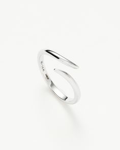 Fine Open Claw Ring | 14ct White Gold gold/white. Our Signature Claw Design Reimagined and Refined. Crafted from 100% Recycled 14Ct Solid White Gold, this Sleek Open Ring is a Timeless Style to Invest In. Every Piece in Our Fine Collection is Hallmarked for Authenticity. Metal: 14Ct Recycled Solid White Gold Band Width: 1. 6mm Weight: 4g Product Code: Fj-Wg-R1-Ns 14k White Gold Open Band Jewelry For Formal Occasions, Formal 14k White Gold Open Band Jewelry, Modern White Gold Bypass Ring For Formal Occasions, Sleek White Gold Jewelry Gift, Sleek White Gold Jewelry For Gifts, Minimalist Polished Bypass Ring For Formal Occasions, White Open Band Ring With Polished Finish, White Open Band Rings With Polished Finish, White Gold Open Band Jewelry For Formal Occasions