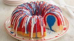 a red, white and blue bundt cake on a plate