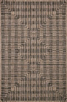 an area rug with black and tan designs on it's sides, in the shape of squares