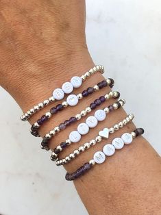 🔹 Design the personalized word bracelet that you have always wanted! These stacking mama bracelets can be customized so you can get exactly what you want. 🔹They are made with amethyst, rose quartz or aquamarine gemstones beads, 18k gold plated beads, 18k gold filled beads, sterling silver beads or rose gold beads and then strung together with a strong elastic cord. 🔹Please add each bracelet style separately to your cart. They will be sent to you as a stack. 🔹Each custom beaded bracelet stack Personalized Letter Beads Bracelets, Inspirational Silver Beaded Bracelets As Gift, Letter Beads Jewelry For Mother's Day, Inspirational Round Beads Name Bracelet, Everyday Inspirational Name Bracelet With Round Beads, Mother's Day Jewelry With Letter Beads In Letter Shape, Personalized Inspirational Stretch Bracelet, Mother's Day Jewelry With Letter Beads, Personalized Inspirational Stretch Bracelet For Everyday