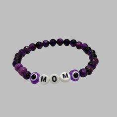 Celebrate the special bond between mother and child with our Mother's Day Bracelet! Made with 6mm or 8mm gemstone beads, this bracelet is a perfect way to show your love and appreciation. Give a meaningful gift that will be cherished for years to come.