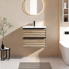 a bathroom with a sink, mirror and bathtub