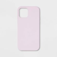 a pink phone case sitting on top of a white surface