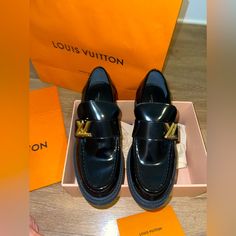 Perfect Condition. Worn Once. Only Selling Because They’re A Bit Too Big For Me. Super Comfortable Otherwise. Color: Noir Size: 395 Eur Width: Medium. Will Come With Bags, Box, And Dusters As Pictured! Luxury Black Loafers With Brogue Detailing, Designer Brogue Detail Loafers With Round Toe, Designer Brogue Loafers With Round Toe, Designer Round Toe Loafers With Brogue Detailing, Designer Loafers With Brogue Detailing And Round Toe, Luxury Black Loafers With Round Toe, Designer Black Loafers With Brogue Detailing, Designer Formal Platform Loafers, Luxury Black Patent Leather Platform Loafers