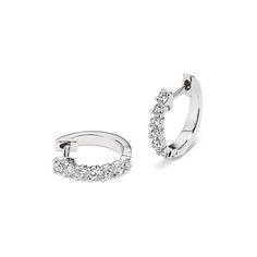 These 14-karat white gold hoop earrings feature natural diamonds for a classic  shimmering look. A secure yet easy hinge back offers worry-free daily wear. White Gold Hoop Earrings, White Gold Hoops, Gold Hoop, Gold Hoop Earrings, Natural Diamonds, Daily Wear, Hoop Earrings, Diamonds, White Gold