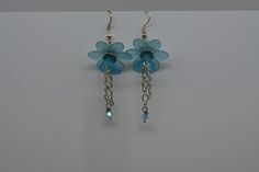 Flower Earrings Lucite Flower Earrings Blue Flower Earrings Blue Dangle Earrings.  Perfect lightweight summer time earrings.  Robins egg blue lucite flowers are joined with silver colored findings to make these cute earrings that are just perfect with a flowing sun dress or just as perfect with t-shirt and shorts. Blue Flower Charm Drop Earrings, Blue Flower Earrings For Pierced Ears, Blue Flower Earrings Nickel Free, Blue Drop Earrings With Flower Charm, Elegant Blue Drop Earrings With Flower Charm, Blue Flower-shaped Earrings With Ear Wire, Blue Flower Earrings For Jewelry Making, Blue Drop Flower Earrings, Blue Drop Flower Earrings With Ear Wire