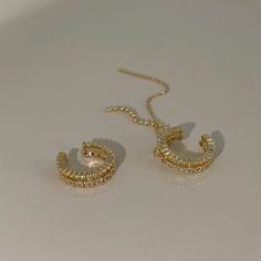 Everyday delicate ear jewelry set, enjoy the fun of mix and match. Dainty gold lace layering cuff earrings and cuff threader. Exquisite sparkly cz embedded layering with gold cuff, matches perfectly with dangling cuff threader. The threader is very versatile, can be wear in 2 ways, both stunning as either pierced or non pierced earrings. Go as you please, be you, be stylish everyday. 💎 Features: ♥ Finish Tone: 14K gold plated ♥ Side Stone: Cz crystal ♥ Ear cuff + Cuff threader Set ♥ Non-pierced Dainty Ear Climbers For Party, Dainty Ear Climbers For Parties, Trendy Ear Climbers As A Gift, Dainty Single Cartilage Earring For Party, Dainty Single Ear Climber For Parties, Elegant Gold Ear Cuff With Adjustable Chain, Dainty Single Ear Cuff For Party, Trendy Gold Ear Climbers With Ear Wire, Trendy Gold Ear Cuff With Ear Wire