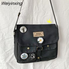 Shipping: Worldwide Express Shipping AvailableDelivery time: 🚚7-15Days Fast ShippingReturns: Fast refund,💯100% Money Back Guarantee.Lining Material: CanvasMain Material: CanvasShape: DoctorPlace Of Origin: SHANG HAIOrigin: Mainland ChinaDecoration: LaceDecoration: NONEHardness: ModerateGender: UnisexStyle: BohemianPattern Type: SolidOccasion: BusinessInterior: Interior Slot PocketExterior: Solid BagModel Number: whiteClosure Type: Zipper & Hasp Retro Bags With Pockets For Daily Use, Retro Shoulder Bag With Pockets, Vintage School Bag With Pockets, Retro School Bags With Pockets, Retro Black Bag With Pockets, Casual Tote Bag, Multipurpose Bag, Student Bag, Travel Storage Bag