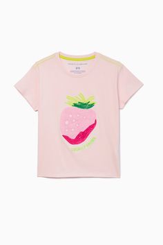 A giant pink strawberry adds super-sweet style to the Fraise Embroidery Tee. Bright neon details make it extra bold! 🍓🍓 Cute Pink T-shirt With Strawberry Print, Pink Fruit Print Tops For Spring, Spring Pink Tops With Fruit Print, Sweet Pink T-shirt With Strawberry Print, Sweet Pink Strawberry Print T-shirt, Cute Pink Fruit Print Tops, Cute Spring Tops With Fruit Design, Pink Strawberry Print Cotton T-shirt, Pink Cotton T-shirt With Strawberry Print