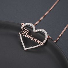 Surrounded Heart Name Necklace is the iconic symbol of love and affection. It symbolizes your love by making a barrier of affection surrounding the name of your choice. Cherish the one you love the most. Let his / her name sparkle near your heart. The pendant designed by our well-experienced jewelry designers based on the universal codes of love. It is not an illusion. The code of love is hidden deep and remains untold in our hearts.... Your pulse is the rhythm of her breath.... Touch your heart Personalized Double Heart Rose Gold Necklace, Customizable Rose Gold Heart Name Necklace, Customizable Rose Gold Heart Necklace, Personalized Heart-shaped Rose Gold Name Necklace, Customizable Heart-shaped Rose Gold Jewelry, Personalized Rose Gold Heart Pendant Necklace, Personalized Rose Gold Heart Name Necklace, Rose Gold Heart Pendant Name Necklace, Personalized Heart Shaped Rose Gold Necklace