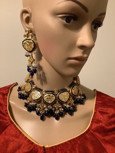 Navy blue stone beads and Gold Meenakari necklace choker collar set with navy blue stone chandeliers. Earrings length is 3 inches. Chandeliers Earrings, Meenakari Necklace, Navy Blue And Gold, Silk Thread Bangles, Fancy Jewellery Designs, Collar Choker, Thread Bangles, Choker Necklace Set, Fancy Jewellery