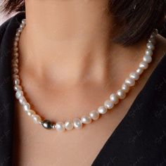 Experience the sheer elegance of this Freshwater Pearl Necklace, featuring a baroque pearl as the center piece and two tiny sterling silver beads for added shine. The silver plated clasp and adjustable chain make it a perfect bridal jewelry gift. Necklace length is 40 cm/ 15.7 inch Jewelry Care: See more information about how to care for your jewelry here. Shipping Policy: Orders will be shipped within 1-3 business days. Economy shipping will take 7-14 days to arrive and standard shipping is 1- Adjustable Pearl Necklace With Round Beads For Anniversary, Adjustable Pearl White Pearl Necklace For Anniversary, Adjustable Round Beads Pearl Necklace For Anniversary, Adjustable Pearl White Necklace For Anniversary, Elegant Adjustable Sterling Silver Pearl Necklace, Formal Adjustable Pearl Necklace With Pendant, Elegant Adjustable Sterling Silver Beaded Necklaces, Elegant Sterling Silver Beaded Necklace, Adjustable Pearl Necklace With Sterling Silver Clasp