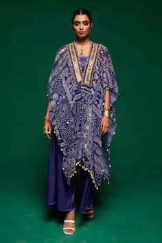 Buy Purple Gajji Silk Printed Geometric Cape Open Flared Pant Set For Women by Payal & Zinal Online at Aza Fashions. Bohemian Kaftan With Cape Sleeves For Festive Season, Festive Bohemian Kaftan With Cape Sleeves, Blue Bohemian Set With Sheer Dupatta, Bohemian Party Sets With Cape Sleeves, Festive Cape-style Kaftan For Parties, Blue Bohemian Designer Wear Dupatta, Blue Bohemian Style Designer Wear Dupatta, Bohemian Palazzo Set With Cape Sleeves For Festive Occasions, Traditional Festive Palazzo Set With Cape