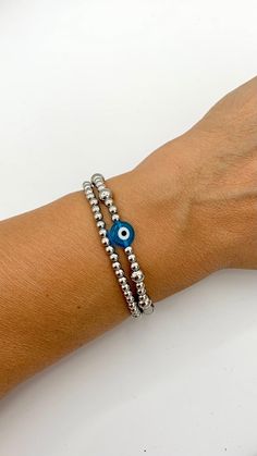 Evil Eye Stacked Bracelets, Stainless Steel Beaded Non Tarnish Bracelet, Evil Eye Jewelry, Good Luck, Bohemian stretch bracelets, Unisex +Materials 4 an 6mm Stainless Steel round beads 10mm Turquoise Blue Evil Eye Glass bead +Size XSmall 6 inches Small 6.5 inches Medium 7 inches Large 7.5 inches XLarge 8 inches If you are not sure about your size please contact me. How to care your bracelet In order to enjoy and use for long time please  >Keep your bracelet in its plastic bag when it is not in u Meaningful Christmas Gifts, Stacked Bracelets, Layering Jewelry, Meaningful Christmas, Bracelet Evil Eye, Evil Eye Protection, Evil Eye Ring, Eye Glass, Blue Evil Eye