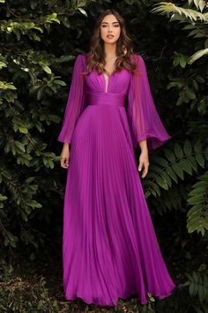 You'll love twirling around in this pleated long bell sleeve dress with A-line skirt. This chiffon gown is pleated from sleeve to hem and gathered at the deep V-neckline and waist. An open mid back has a center back zipper closure. Flowy Pleated Long-Sleeve Chiffon Gown Deep V-neck illusion bodice with bell sleeves Open V-back Floor length A-line skirt Details: Bra Cup, Fully Lined Fit: The model is 5'8" and is wearing 4" heels Occasions: Prom, Red Carpet, Gala, Wedding Guest, Debutante Ball, Mi Sukienki Maksi, Unique Formal Dresses, Cinderella Divine, Deep V Neck Dress, Evening Dresses With Sleeves, Prom Ball Gown, Unique Prom Dresses, Long Sleeve Gown, Pleated Chiffon