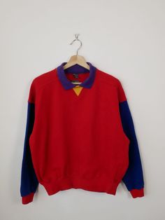 Vintage Red/Purple/Blue Color Blocked  Sweatshirt/Collar Sweatshirt. Measurements Length                   : 22" Armpit to armpit  : 22" Armpit to end of sleeve: 17 1/2" Condition             : Gently used. There's a tiny spot as shown in the last pic.  ※Please read the policy before you purchase※ Sporty Multicolor Color Block Sweater, Sporty Crew Neck Sweatshirt With Color Matching, Purple Patchwork Long Sleeve Top, Purple Long Sleeve Patchwork Top, Purple Long Sleeve Top With Patchwork, Retro Long Sleeve Color Block Tops, Retro Color Block Long Sleeve Tops, Retro Long Sleeve Purple Sweatshirt, Retro Purple Long Sleeve Sweatshirt