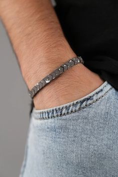 Introducing our Men's Colorfast Natural Stone Bracelet - a perfect blend of style and durability. Crafted with precision, this bracelet features genuine natural stones that not only add a touch of sophistication but also offer timeless elegance. What sets it apart is its colorfast technology, ensuring the vibrancy of the stones remains intact, resisting fading over time. The sturdy construction and adjustable fit make it a versatile accessory for any occasion, adding a masculine and refined touch to your look. Elevate your style with the enduring charm of our Men's Colorfast Natural Stone Bracelet. Adjustable Hematite Bracelets, Adjustable Magnetic Minimalist Jewelry, Minimalist Magnetic Adjustable Jewelry, Minimalist Magnetic Jewelry, Silver Minimalist Magnetic Bracelet, Minimalist Silver Magnetic Bracelet, Minimalist Magnetic Silver Bracelet, Bracelets Design, Design Bracelet