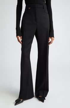 Crisp creases further the polished look of these high-rise wool pants designed in a flare-leg silhouette. 34" inseam; 24" leg opening; 14 1/2" front rise; 17" back rise (size 42) Zip fly with hook-and-bar closure Front scoop pockets 100% wool Dry clean Imported Designer Clothing Elegant Wool Dress Pants For Fall, Tailored Wide-leg Evening Pantsuit, Tailored Evening Pantsuit With Wide-leg Pants, Elegant Flare Dress Pants For Formal Occasions, Elegant Wool Pants For Fall, Elegant Flare Bottoms For Formal Occasions, Modern Full Length Wide Leg Pants For Evening, Tailored Evening Pantsuit In Elastane, Evening Wide Leg Elastane Pants