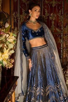 Blue velvet lehenga with zari, stone, sequin and thread embrioidery. Paired with an off shoulder embroidered velvet blouse and net dupatta. - Aza Fashions Blue Velvet Lehenga, Off Shoulder Lehenga, Lehenga Blue, Chip Recipes, Lehenga And Blouse, Brocade Lehenga, Lehenga Pattern, Velvet Lehenga, Reception Outfit