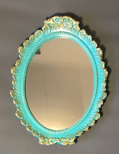 a mirror that is hanging on the wall