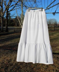 Handmade petticoat made from quality snow white cotton broadcloth.  Essential foundation garment for many historical looks!  For teen or small women size.  Adjustable drawstring with twill tape.  12 1/4" ruffle.  Carefully constructed with French and serged seams. Machine washable and dryable. Waist: approximately 23 - 35" Length: 33" Small Women, Women's Costumes, Twill Tape, Petticoat, White Cotton, Favorite Outfit, Snow White, Foundation, Womens Sizes