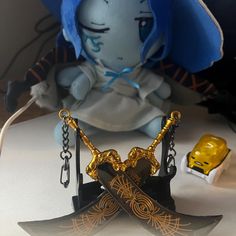 I'm a huge Souls fan and am here on Etsy to try and provide affordable Elden Ring merch to all fans! I got on here nowadays and see keychains like this go for insane prices, I so if you want some affordable but high quality sword props, keychains, pins, plushies, and more, please give my shop some of your attention <3 DETAILS: Sword is high quality metal and about 5 inches long, very big and sturdy  I haven't beat the DLC yet but I'm so hype for to kill the final boss! Radahn in the base game wa Nox Swordstress Elden Ring, Elden Ring Merch, Ansbach Elden Ring, Vyke Elden Rings, Starscourge Radahn, Dragonlord Placidusax Elden Ring, Dual Swords, Grace Symbol, Final Boss