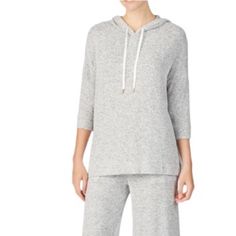 Super Comfy And Cute Medium Donna Karan Grey Loungewear Set. The Top Is 3/4” Sleeves With A Drawstring Hood And Small Slits On Each Side. The Bottoms Are Also Cropped Into Capris, Has Pockets, And A Drawstring. This Set Is So Incredibly Soft. You Can Wear It Lounging Or Running Errands! *New Without Tags! And In Perfect Condition! Winter Lounging Top With Drawstring Hood, Cozy Stretch Hoodie For Loungewear, Cozy Fit Tops With Drawstring Hood For Loungewear, Cozy Fit Lounge Tops With Drawstring Hood, Cozy Stretch Top With Drawstring Hood, Cozy Stretch Tops With Drawstring Hood, Cozy Spring Top With Drawstring Hood, Comfy Spring Hoodie For Loungewear, Cozy Tops With Drawstring Hood For Spring