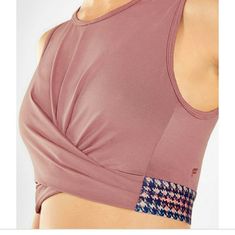 Fabletics Powertouch Light Front Twist Tank Is An Easy Choice For Athleic Leisure Wear. Nwt. Sz M Sleeveless Pink Top For Pilates, Pink Compressive Sleeveless Activewear, Pink Bra Friendly Top For Pilates, Bra Friendly Pink Tops For Pilates, Pink Compressive Top, Bra Friendly, Compressive Pink Bra-friendly Top, Pink Compressive Bra-friendly Top, Pink Breathable Tops For Pilates, Pink Moisture-wicking Tops For Pilates