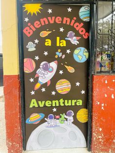 a door with an advertisement on it that says benvenios a la aventura