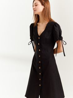 "MONICA is a knee length linen button down dress. DETAILS - Center front buttons - V neck - Knee length - Fitted bodice - No pockets - Oeko-Tex certified 100% lightweight linen - Cut and sewn to order just for you in our studio COLOR - Black, you can also choose other colors above - Fabric samples are available here https://www.etsy.com/listing/586569696/linen-fabric-samples SIZING & FIT - Fits true to size - Length (shoulder to hem) is approximately 39 inches / 99 cm - Bust approximately 33 Linen Mini Dress With Buttons, Summer Linen Mini Dress With Buttons, Chic Linen Button-up Dress, Fitted V-neck Linen Dress With Buttons, Chic Short Sleeve Linen Dress With Buttons, Short Sleeve Linen Dress With Buttons For Day Out, Puff Sleeve Button Dress For Daywear, Buttoned Linen Mini Dress, Puff Sleeve Mini Dress For Work With Buttons