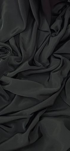 the black fabric is very soft and drapy