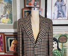 "1970s Houndstooth jacket with lots of earthy tones over tan - size medium -  Measurements:  20\" shoulder to shoulder from the back  42\" chest 38\"waist,  32\" neck to hem,  19\" underarm to hem. INTERNATIONAL CUSTOMER?? Please email for Shipping Costs" Vintage Houndstooth Outerwear With Notch Lapel, Fitted Vintage Outerwear With Houndstooth Pattern, Retro Notch Lapel Outerwear For Fall, Retro Brown Long Sleeve Tweed Jacket, Fall Brown Houndstooth Sport Coat, Retro Fitted Sport Coat For Fall, Fitted Retro Sport Coat For Fall, Vintage Tweed Jacket With Houndstooth Pattern, Vintage Houndstooth Tweed Jacket With Notch Lapel