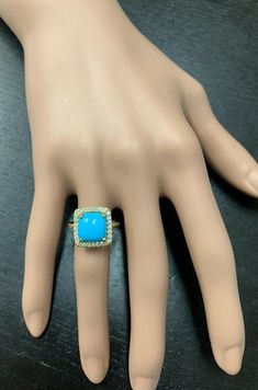 3.60 Carats Natural Turquoise and Diamond 14k Solid Yellow Gold Ring For Sale at 1stDibs Luxury Turquoise Diamond Ring As Gift, Luxury Turquoise 14k Gold Ring, Luxury Turquoise Jewelry With Center Stone, Luxury Blue Turquoise Ring For Wedding, Formal Fine Jewelry Turquoise Ring With Accent Stones, Luxury Blue Turquoise Ring For Formal Occasions, Luxury Turquoise Cabochon Ring, Luxury Turquoise Anniversary Ring, Formal Turquoise Multi-stone Rings