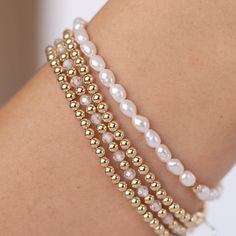 Why not start your stack with this dainty freshwater pearl bracelet?  Pair it with our gold filled beads or sterling silver to create a classic and timeless stack.   The 3mm rice shaped freshwater pearls are genuine and natural and as such have irregular shapes.  It is ready to wear alone or stack with your metal or gemstones.  Each pearl bracelet has one metal bead. Choose gold or silver from dropdown. Gold bracelets shown are available here: https://perlinebyamymegan.etsy.com/listing/174633316 Dainty Stackable Pearl Bracelet, Dainty Stackable Pearl Bracelet For Everyday, Dainty Pearl Bracelet, Bracelet Layering, Irregular Shapes, Metal Bead, Bracelet Dainty, Freshwater Pearl Bracelet, Gold Bracelets