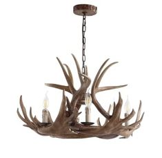 the antler chandelier is made from wood and has five lights on it