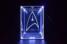 Our LED display case is perfect for action figures, Lego sets, Funko pops, and any other collectibles. It is made from the best quality acrylic panels that are so clear and transparent that you can see through them as if they don't exist. And with the ability to customize any logo or picture on the display case, you can truly make it your own. With Bluetooth control, you can easily switch between over 200 different color modes and choose from 16 million colors to light up your models. Imagine ho Star Trek Collectibles, Acrylic Display Case, Star Trek Enterprise, Toy Collector, Acrylic Panels, Acrylic Display, Funko Pops, Lego Sets, Led Display