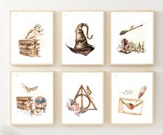 four harry potter prints are hanging on the wall