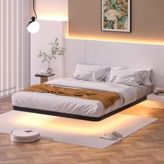 a bed with white sheets and pillows in a room that has wood flooring on it