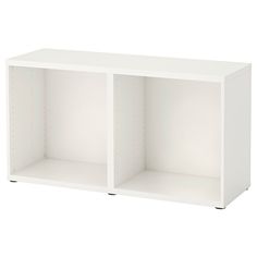 a white shelf with two open shelves on each side