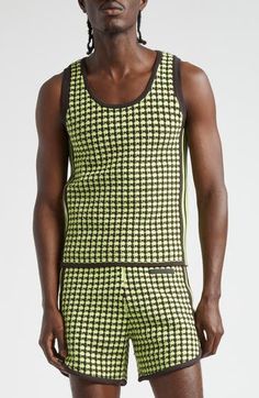 Signature 3-Stripes race along the sides of this richly textured sweater-tank reimagined in a collaboration by Yohji Yamamoto and design house Wales Bonner. 25" length (size Medium) Scoop neck 100% polyester Machine wash, dry flat Imported Designer Clothing Casual Jacquard Knit Sleeveless Top, Sporty Green Ribbed Tank Top, Green Ribbed Athleisure Top, Sporty Knit Fitted Tops, Sporty Fitted Knit Tops, Fitted Green Jacquard Knit Top, Sporty Knit Tops For Winter, Fitted Knit Sporty Tops, Yellow Night