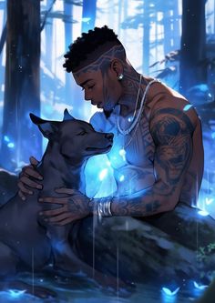 a man with tattoos holding a dog in the woods