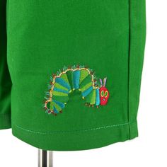 These classic green cotton shorts feature our friend the Very Hungry Caterpillar beautifully embroidered on the left leg. Brand new for 2024 from our World of Eric Carle™ + Little Goodall collaboration, these shorts pair perfectly with any of our Very Hungry Caterpillar shirts for a birthday party outfit as cute as it is comfortable. Cut from soft 100% cotton twill with a pull on elastic waist, they're elevated basics that are festive enough for special occasions too! Adorable paired with our Ve Hungry Caterpillar Shirt, Hungry Caterpillar Party, Birthday Party Outfit, Strawberry Shirt, Food Shirt, Birthday Party Outfits, The Very Hungry Caterpillar, Elevated Basics, Very Hungry Caterpillar