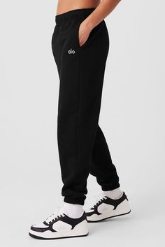 The search for the perfect lounge-to-street look is over. Our iconic sweats have classic details, like an elastic waistband and cuffs, plus a relaxed fit that reads laid-back but not slouchy (since this is a unisex style, we recommend sizing down to achieve this look). The French terry feels smooth on the outside and fleecy on the inside. And may we suggest a matching Accolade Hoodie or Crew Neck? Find your fit and see all the ways to style it. EXPLORE ACCOLADE. Sporty Cotton Bottoms By Alo Yoga, Casual Alo Yoga Bottoms With Comfort Waistband, Alo Yoga Casual Bottoms With Comfort Waistband, Alo Yoga Relaxed Fit Pants, Alo Yoga Casual Cotton Sweatpants, Alo Yoga Casual Relaxed Fit Bottoms, Alo Yoga Casual Bottoms With Relaxed Fit, Alo Yoga Sporty Cotton Pants, Alo Yoga Relaxed Fit Pants With Elastic Waistband