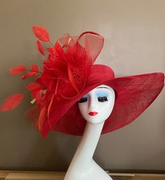 Wide brim sinamay hat with large bow and feather flower, elegant, light and comfortable to wear. Perfect for weddings, Royal Ascot horse races, cocktails, tea party, derby, or any hat wearing occasion. Head size is about 22.5" unless otherwise requested. All hats include a sizing band to adjust for a comfortable fit.  Warm tips:  ❤️Group discount on 3 or more pieces, please contact me for further information on group discount. ❤️Due to the nature of my items, I do not accept returns, but contact me if there's problem with your order Key Features: Wide brim Appr: 6" Head Grith Appr: 22.5" and adjustable to fit sizes smaller than 22.5" Crown Deep Appr: 4.5" Processing Time: 1-3 business days Red Summer Hats For Garden Party, Chic Party Hats With Feathers, Chic Party Hat With Feathers, Summer Evening Costume Hat With Feather Trim, Summer Evening Mini Hat With Feather Trim, Brimmed Party Hats With Feather Trim, Summer Party Hat With Feather Trim, Red Hats For Spring Garden Party, Chic Party Hats With Feather Trim